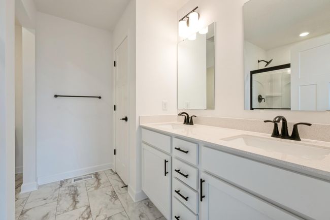 Photo is of the actual home. Primary bath. | Image 10