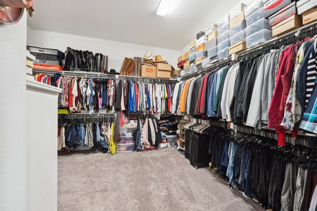 Walk in closet with carpet flooring | Image 22