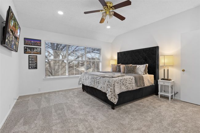 Carpeted bedroom featuring recessed lighting, a ceiling fan, and vaulted ceiling | Image 10