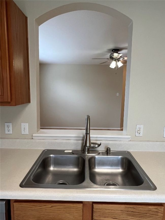 Kitchen sink area with pass through | Image 19