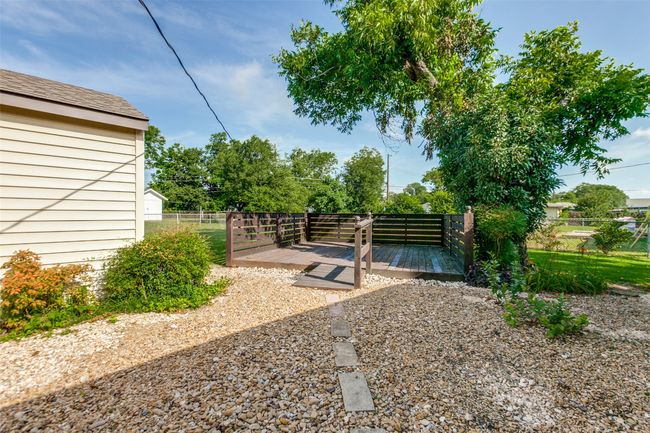 View of yard with a deck | Image 21