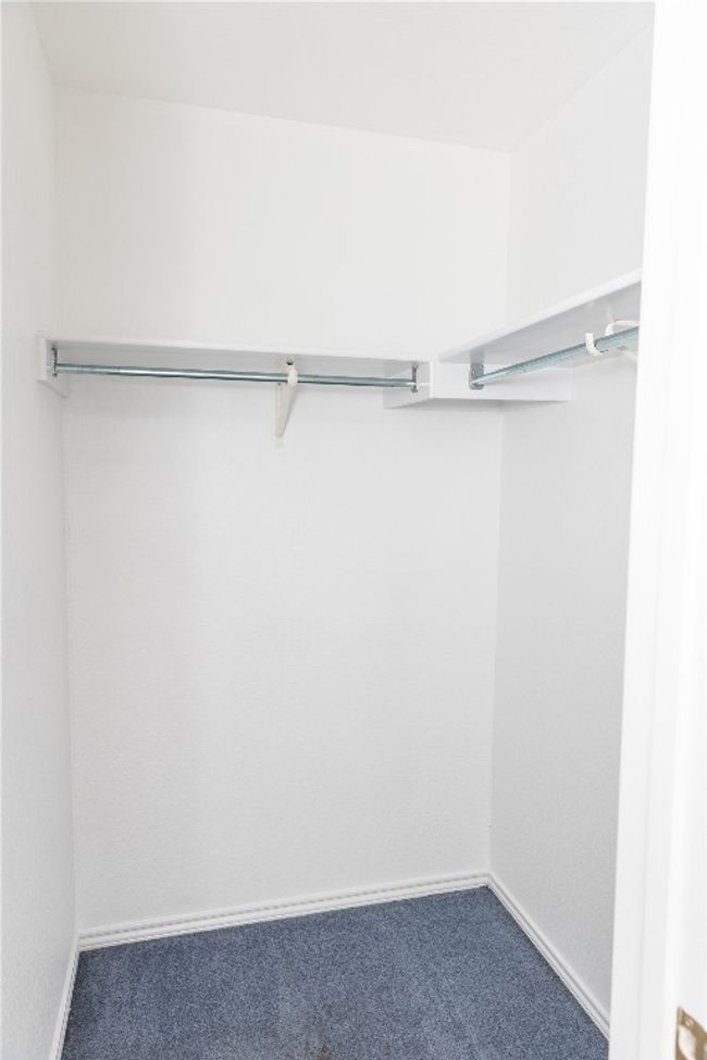Walk in closet with carpet | Image 16