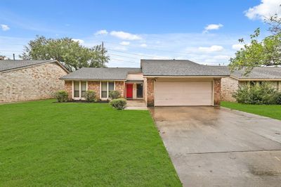 This 1.5 story home provides comfortable living with 4 bedrooms and 3 bathrooms. | Image 2