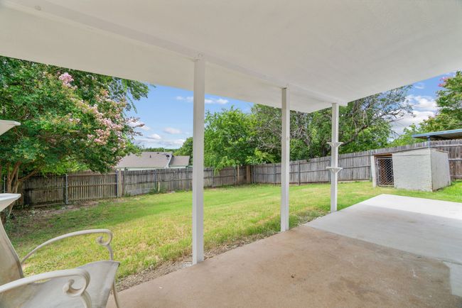 Fenced backyard featuring a patio | Image 31