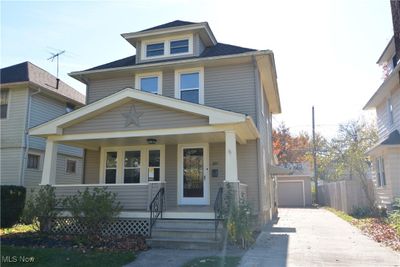 View of front of property with a porch and a garage | Image 3