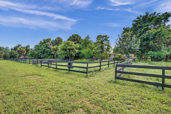 502 Rambling Drive Cir, House other with 5 bedrooms, 3 bathrooms and null parking in Wellington FL | Image 68