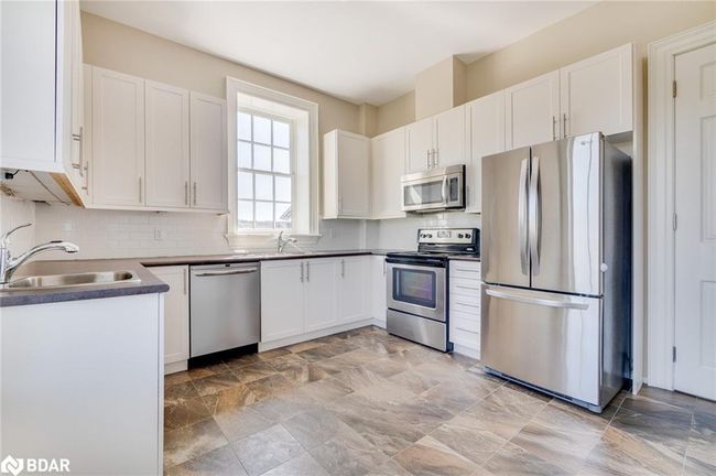 112 - 33 Whitmer St, House attached with 2 bedrooms, 2 bathrooms and 1 parking in Milton ON | Image 39
