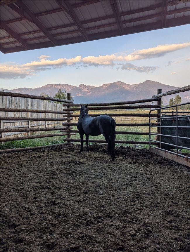 Horse barn featuring a mountain view | Image 33