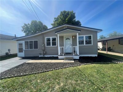 View of front of house featuring a front yard | Image 1