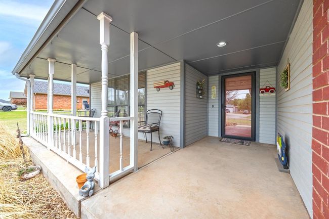 View of patio / terrace featuring covered porch | Image 7