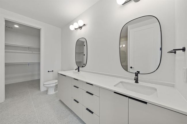 Primary Bathroom features dual vanities | Image 12