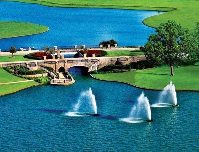 Explore nature right at your doorstep with the picturesque bridge, walking trails, and serene lake in Riverstone. Whether you’re enjoying a leisurely stroll, jogging, or simply soaking in the beauty of the surroundings, these peaceful outdoor spaces are perfect for an active lifestyle. | Image 9