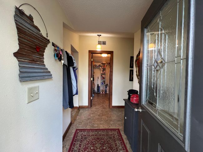 Entryway with convenient access to the walk-in pantry | Image 14