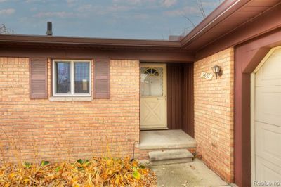 1697 Ranier Boulevard, Home with 3 bedrooms, 2 bathrooms and null parking in Canton Twp MI | Image 2