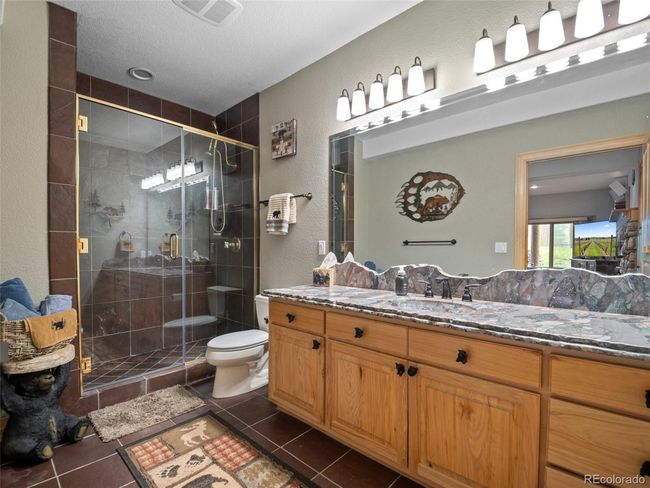 23076 Oehlmann Park Rd, House other with 5 bedrooms, 6 bathrooms and null parking in Conifer CO | Image 31