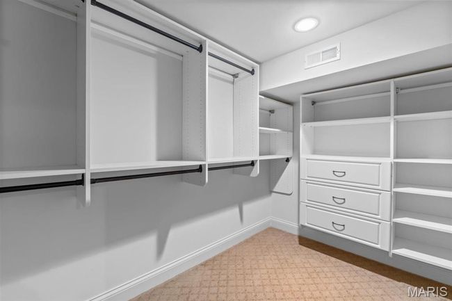 Walk in closet with carpet flooring | Image 57