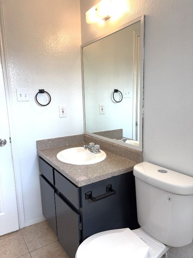 Bathroom featuring vanity and tile patterned floors | Image 14