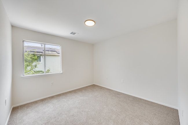 Carpeted spare room featuring baseboards | Image 25