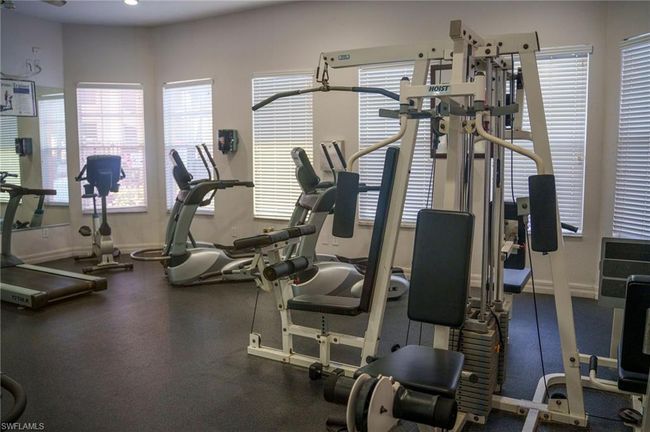 Exercise room featuring baseboards | Image 35