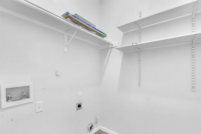 Laundry area featuring hookup for a gas dryer, hookup for a washing machine, and electric dryer hookup | Image 25
