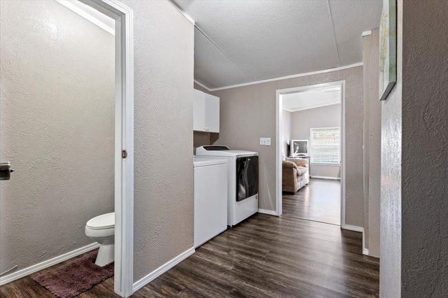 1/2 bath off utility room and second living area | Image 28