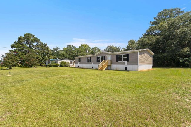 Manufactured / mobile home featuring a front lawn | Image 6