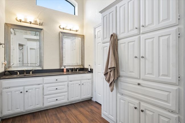 Lots of cabinet space in the primary bathroom! | Image 28
