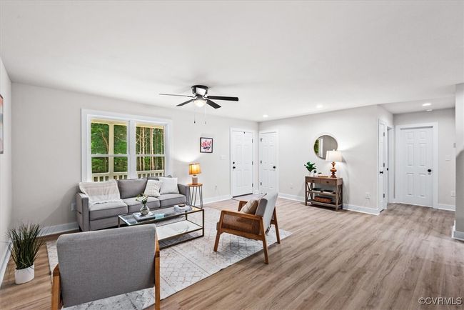 Large family room open to kitchen and dining | Image 4