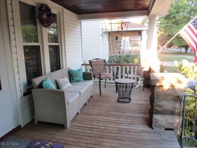 Wooden deck featuring an outdoor living space and covered porch | Image 3