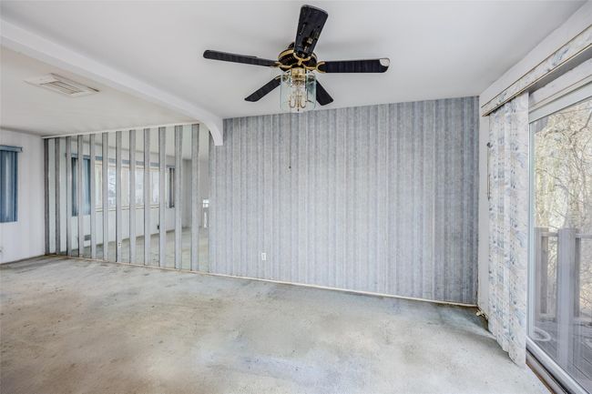 Empty room featuring concrete floors and visible vents | Image 10