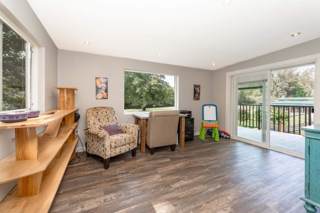 Sitting room featuring wood finished floors and recessed lighting | Image 13