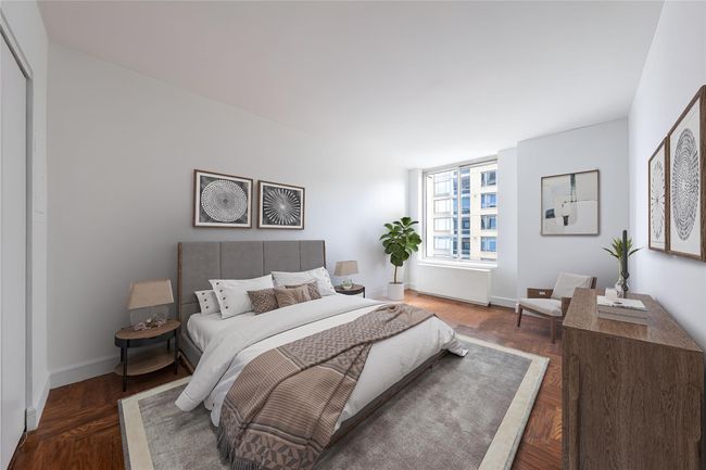 Bedroom featuring baseboards | Image 4