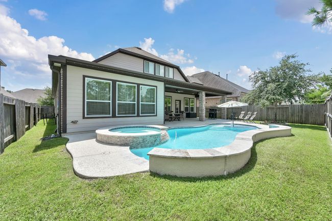 Enjoy summers poolside or winters in your heated hot tub. | Image 28