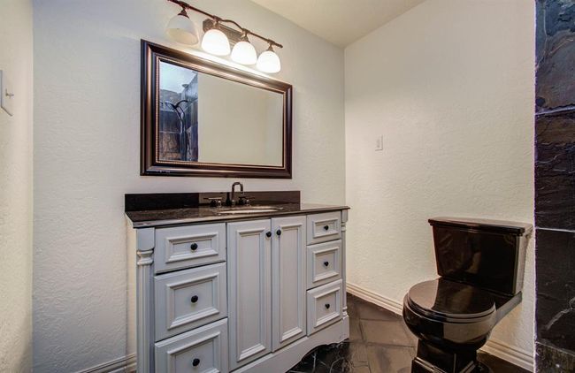 Custom vanity in primary bathroom. | Image 9