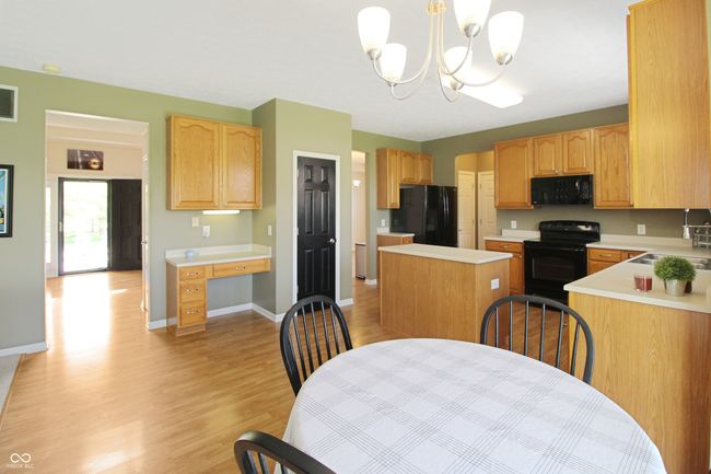 Enjoy effortless entertaining and flexible living in this desirable open floor plan. Perfect for connecting with family and friends. | Image 8