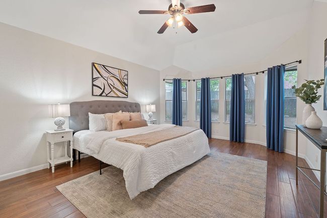 The primary suite is a secluded retreat with beautiful bay windows, two closets, and a private ensuite bath. | Image 4