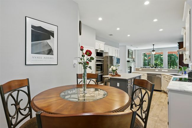 breakfast area featuring recessed lighting | Image 13
