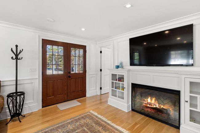 Foyer entrance with crown molding, french doors, and hardwood / wood-style flooring | Image 13