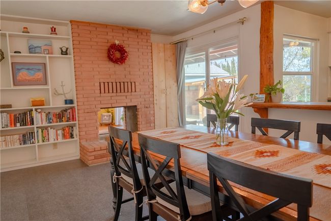 Double Sided fire place. The opposite side is the living area/family room | Image 11
