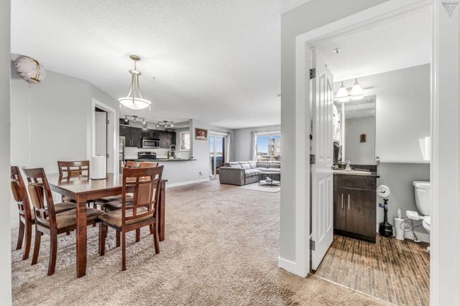 2314 - 403 Mackenzie Way Sw, Home with 2 bedrooms, 2 bathrooms and 1 parking in Airdrie AB | Image 3