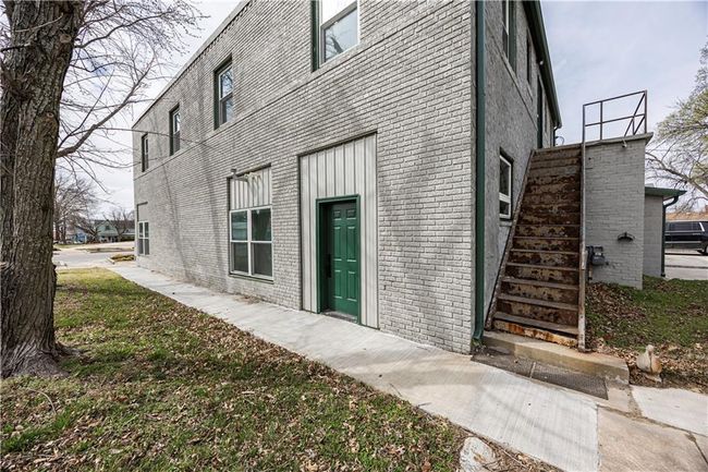 Property entrance with brick siding | Image 63