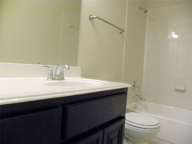 Bathroom with vanity and shower / bath combination | Image 26