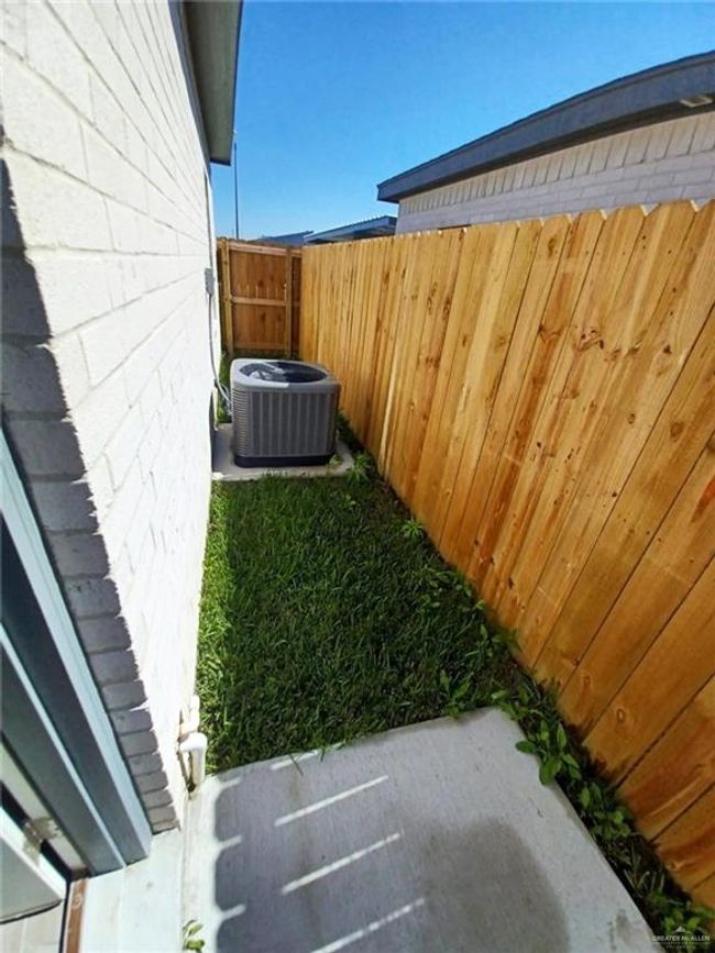 View of yard featuring central air condition unit | Image 13