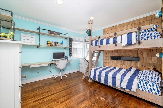 Bedroom featuring baseboards, ornamental molding, wood finished floors, and recessed lighting | Image 17