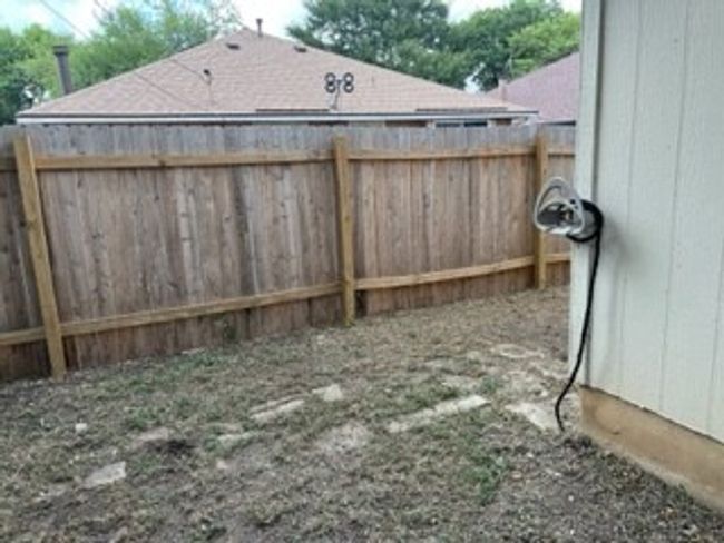 Side yard wraps into smaller backyard | Image 12