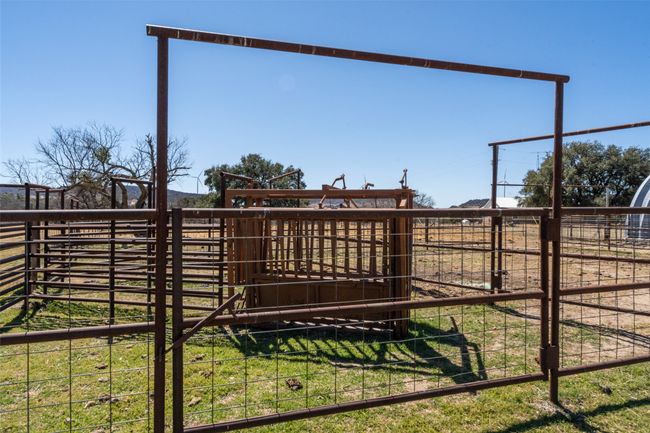 View of yard featuring an outdoor structure and a rural view | Image 20