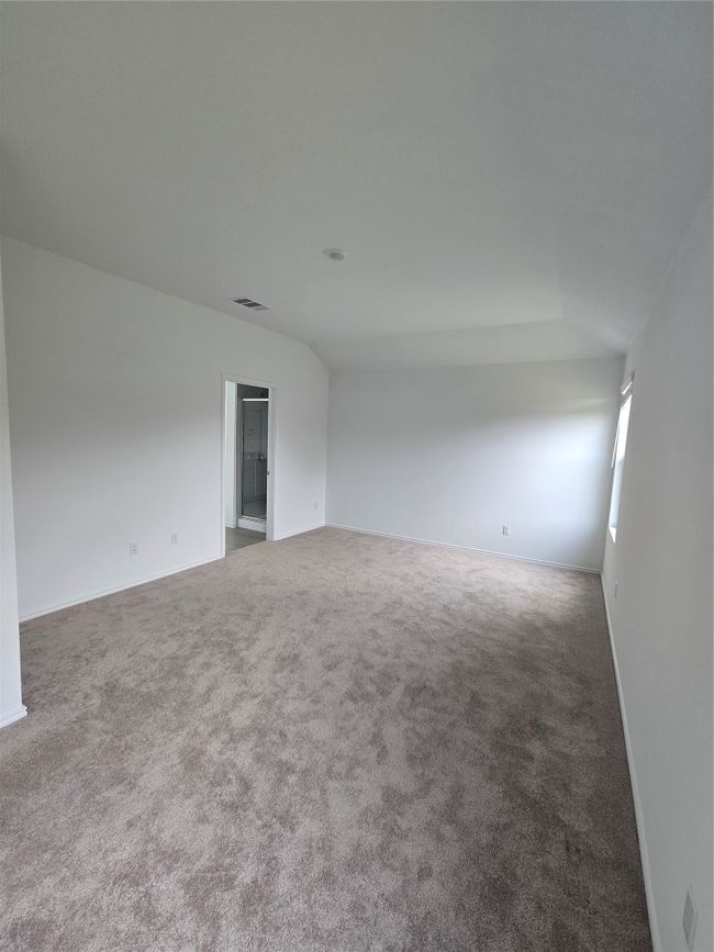 Spare room featuring carpet flooring | Image 14