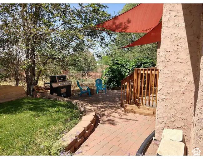 View of patio featuring grilling area | Image 18