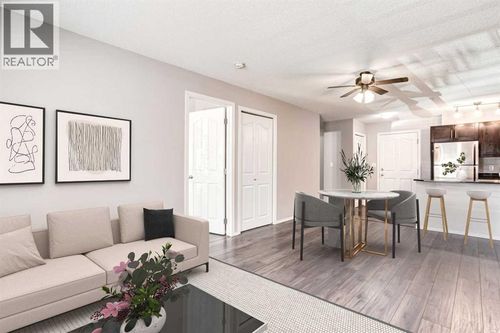 7306-403 Mackenzie Way Sw, Airdrie, AB, T4B3V7 | Card Image