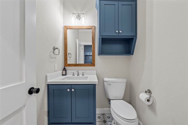 Bathroom featuring vanity, baseboards, and toilet | Image 29